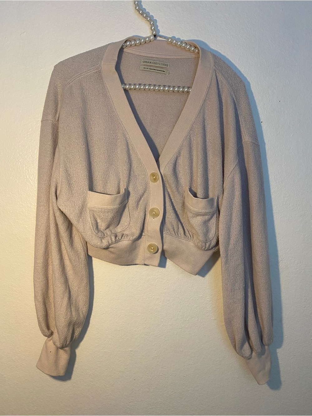 Urban Outfitters cream cropped cardigan with button-up front and pockets XS